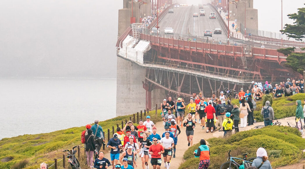 Header for the 2024 San Francisco Marathon Athlete Guide with runners running from the olden Gate Bridge